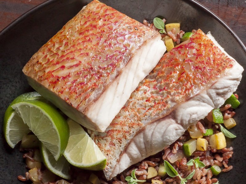 Snapper Portions on a bed of Brown Rice and Vegetables
